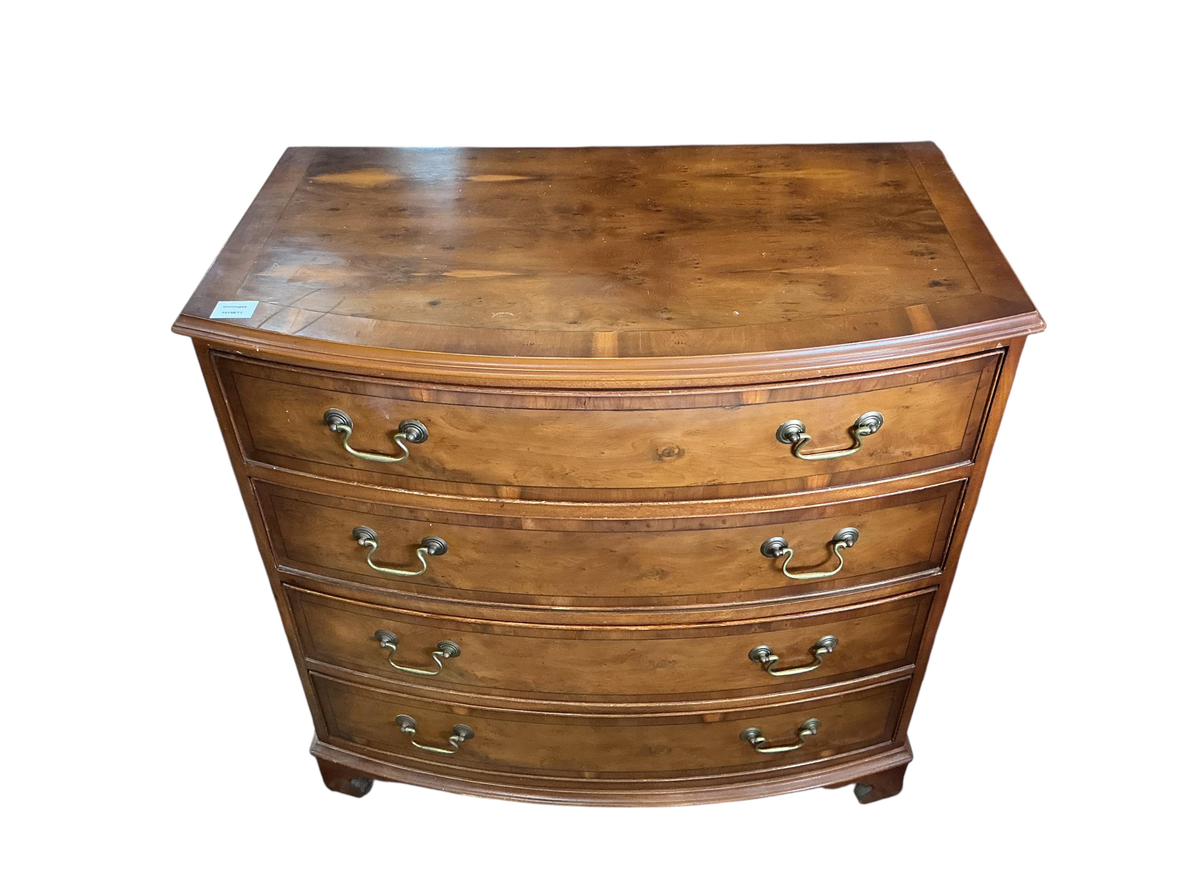 A small reproduction Regency style yew bowfront chest, width 86cm, depth 50cm, height 84cm